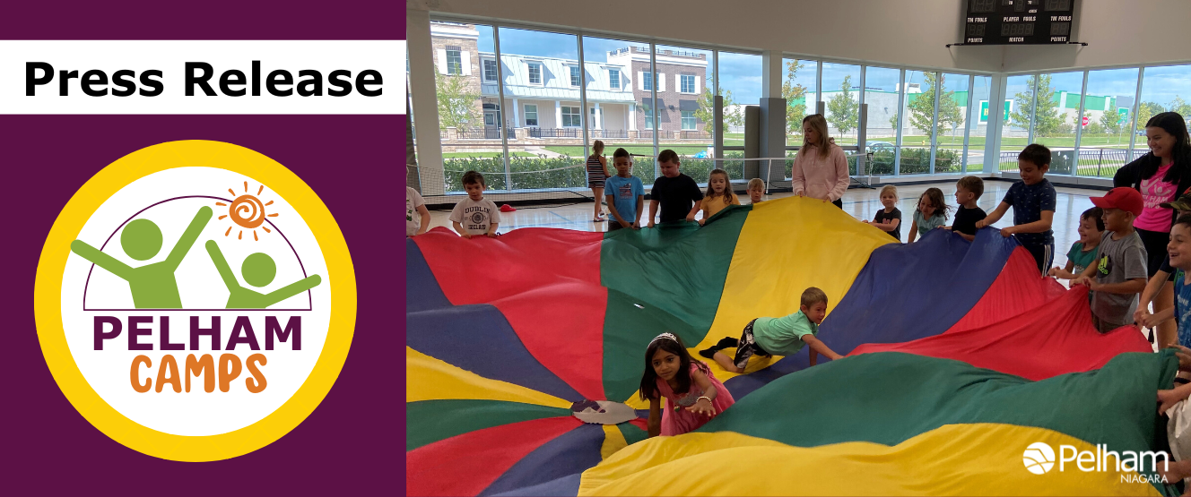 Press Release Town of Pelham Campers in a gym playing with a parachute