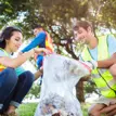 People cleaning up garbage 