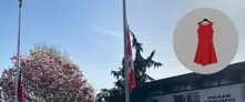 Flags at half mast with graphic of a red dress 